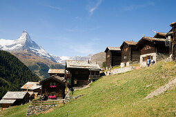 Wooden alpine houses of a mountain village, Findeln, Matterhorn 4478 m in the background, Zermatt, Valais, Switzerland