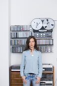 Young woman listening to music about earphones