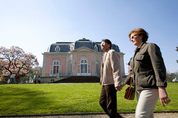 old couple passing by, holding hands, castle of Benrath, world heritage of UNESCO, sightseeing spot, local recreation area, Düsseldorf, state capital of NRW, North-Rhine-Westphalia, Germany