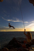 Free climber rappelling, Nosy Andantsara, Madagascar