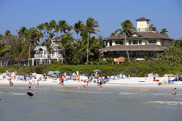 Municipal beach and homes in Naples, Florida, USA