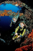 Two Scuba diver examine ship wreck Liberty, Bali, Tulamben, Indian Ocean, Indonesia