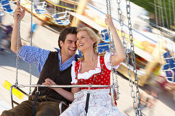 Couple in a chairoplane