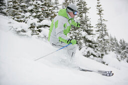 Skier on slope, Sunshine Village ski resort, Banff, Alberta, Canada