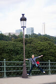 Woman at street lamp, Luxembourg