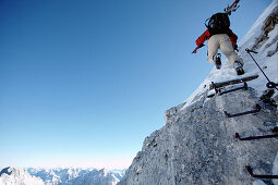 Skier ascenting a mountain, Ehrwald, Tyrol, Austria