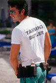 Tanning Butler im Hotel Ritz Carlton, South Beach, Miami, Florida, USA