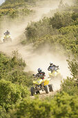 Three people driving Suzuki Quads, Suzuki Offroad Camp, Valencia, Spain