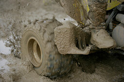 Man driving Suzuki Quad through mud, Test Grounds, Suzuki Offroad Camp, Valencia, Spain