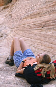 Hiker resting at Zion National Park. Utah. USA