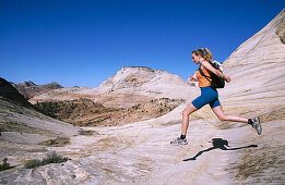 Hiker jumping. Zion National Park. Utah . USA