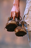 Hiker with muddy boots. Utah, USA