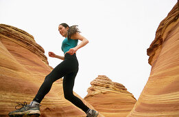 Trail running. The Wave . Coyote Buttes. Grand Staircase-Escalante National Monument. Utah. USA