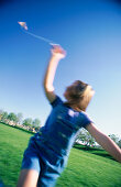 Child flying kite