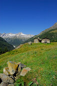 stone houses of Alp Senevedo, Bernina range, Italy