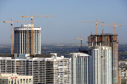 High rise building site and cranes at downtown, Miami, Florida, USA