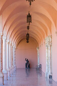 Statue at a colonnade at Ringling Museum of Art, Sarasota, Florida, USA