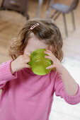 Three year old girl drinking milk