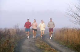 four friends jogging