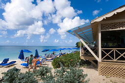 People relaxing at beach, Mullins Bay, Speightstown, Barbados, Caribbean