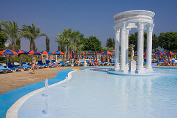 People relaxing at the pool, WaterWorld Waterpark, Agia Napa, South Cyprus, Cyprus