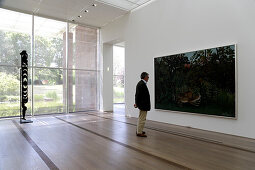Person looking at a painting, artwork in Fondation Beyeler, Basel, Switzerland