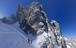 Two backcountry skiers ascending, Griesner Kar, Wilder Kaiser, Kaiser range, Tyrol, Austria