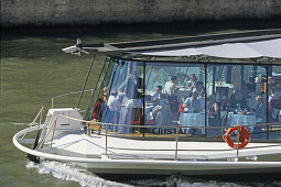 Les Bateaux, people at a restaurant boat on the Seine river, Paris, France, Europe