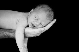 Newborn Baby lying on his fathers arm, Child, Birth, Family