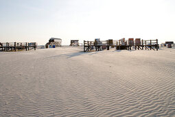 Beach chairs on the beach in the sunlight, St. Peter Ording, Eiderstedt peninsula, Schleswig Holstein, Germany, Europa