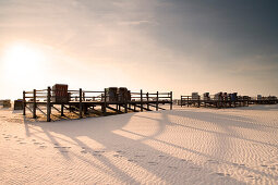 Beach chairs on the beach at sunrise, St. Peter Ording, Eiderstedt peninsula, Schleswig Holstein, Germany, Europa