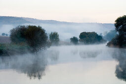 Fog over river Weser near Hedemunden, Lower Saxony, Germany