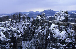 View to Bastei bridge in winter, Saxon Switzerland, Elbe Sandstone Mountains, Saxony, Germany