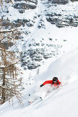 A skier going downhill in the powder snow, Krippenstein, Austria