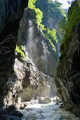 Hiking in Partnachklamm gorge near Garmisch Partenkirchen, Upper Bavaria, Germany