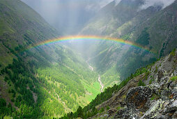 rainbow above valley Pfossental, Texelgruppe range, Ötztal range, South Tyrol, Italy