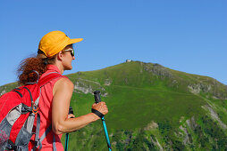 young woman on trail to Statzer Haus on Hundstein, Salzburger Schieferalpen range, Salzburg, Austria