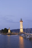 Port entrance with New Lindau Lighthouse and Bavarian Lion, Lindau, Bavaria, Germany