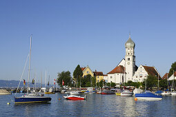 View over lake Constance to Wasserburg with St George's Church, Bavaria, Germany