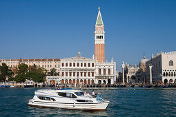 Le Boat Magnifique houseboat with the Campanile Tower and Basilica di San Marco, Venice, Veneto, Italy