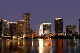 The illuminated high rise buildings at downtown at night, Miami, Florida, USA