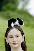 Girl with baby rabbit