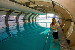 Badeschiff, cleaning the floating swimming pool, Berlin
