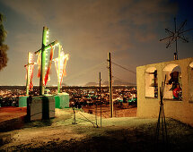 Illuminated roof of a church in the evening, view at Mexico City, Mexico, America