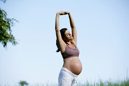 Pregnant woman stretching