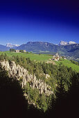 Earth pyramids at Renon, Ritten, view to Monte Sciliar, Dolomite Alps, South Tyrol, Italy