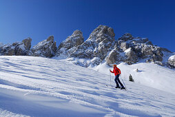 Woman backcountry skiing, Cadini range, Dolomites, Trentino-Alto Adige/Südtirol, Italy