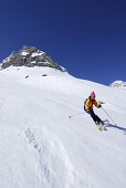 Woman downhill skiing from Loferer Skihoerndl, Salzburg, Austria