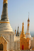 Stupas of the Taung Tho Kyaung Pagoda in the sunlight, Shan State, Myanmar, Burma, Asia