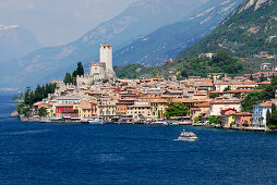 View over lake Gardo to Malcesine with Scaliger Castle, Malcesine, Veneto, Italy